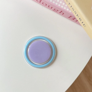 Detail of minimalist macaron phone grip in purple and blue with clear acrylic finish