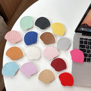Colorful shell-shaped faux leather phone grips with litchi texture and butterfly motif