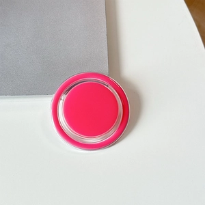 Detail view of pink magnetic collapsible phone socket with transparent acrylic ring edge