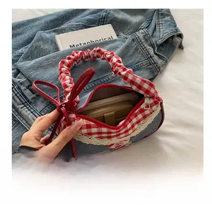 Internal storage view of denim tote showing space for phone and long wallet