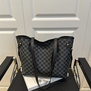 Vintage large capacity tote bag featuring black M-letter pattern and leather straps