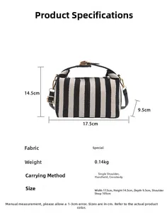 Detailed dimension guide for black and white striped small crossbody bag weighing 0.14kg