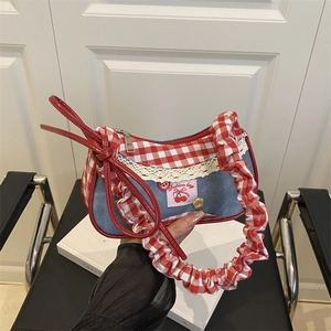 Fashionable denim and red gingham handbag with cherry embroidery and lace detail