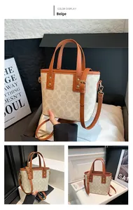 Details der beigen Eimertasche mit braunem Lederbesatz und Monogramm-Canvas-Textur