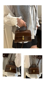 Three views of a brown patent leather baguette bag with a gold U-shaped buckle detail