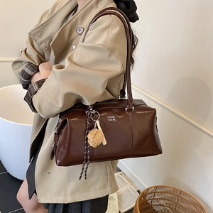 Glossy dark brown bowling bag with bear charm and letter print in casual style
