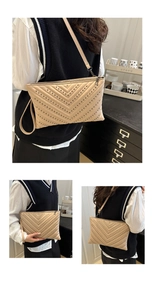 Detail of beige studded clutch showing shoulder, wristlet and side crossbody styles