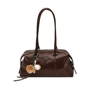 Vintage dark brown leather bowling bag with baseball charms and silver logo detail