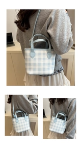 Detail showing blue gingham pattern fabric and light blue leather trim on mini square bag