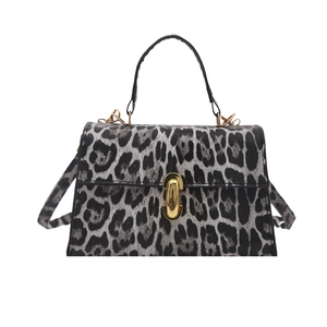 Fashionable leopard print handbag for women with gold metallic buckle and black top handle