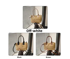 Detailed view of woven mini tote bags in cream, black, and brown with TOTE BAG logo