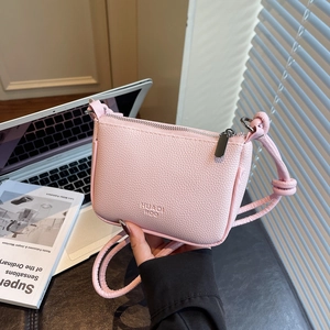 Pink lychee texture crossbody square bag with silver zipper for casual daily styling