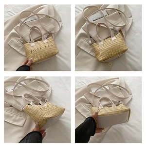 Detail views of woven straw tote bag featuring white handles and embroidered logo design