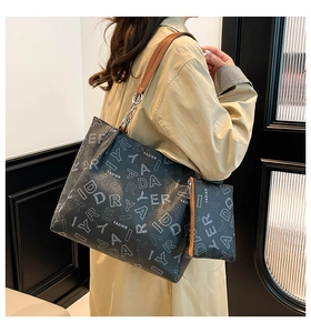 Chic black tote bag and small pouch set featuring white letter print and silver hardware