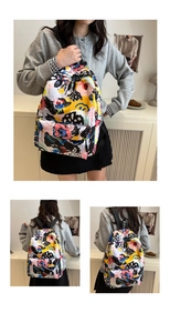 Detailed view of colorful graffiti print backpack with durable fabric and zipper straps