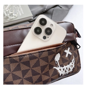 Detail of coffee brown quilted crossbody bag showing storage capacity for iPhone Pro