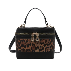 Retro leopard print crossbody bag with black leather patchwork and gold zippers