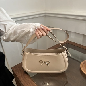 Chic beige underarm bag with gold bow clasp, fashion shoulder purse for women