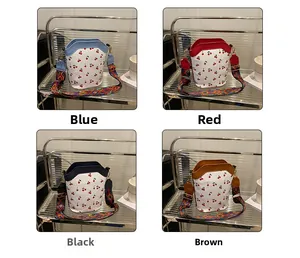 Collage of cherry print bucket bags in four colors with ethnic style wide straps
