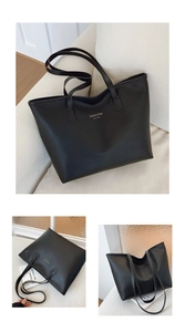Detalle de bolso tote minimalista de cuero sintético negro con letras NEW YORK en oro