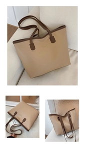 Detalle del bolso tote grande con asas en contraste y estampado New York de moda