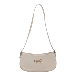 Elegant cream white underarm baguette bag with a decorative gold bow metal buckle