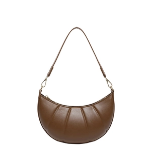 Brown leather crescent underarm bag with quilted pleats and golden metal hardware