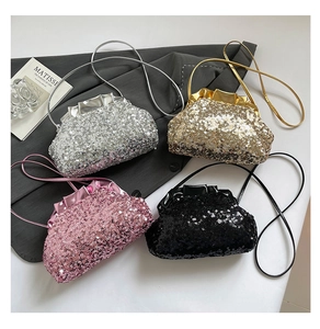 Close-up of sequined cloud bags in silver, gold, pink, and black colors with chic fold design