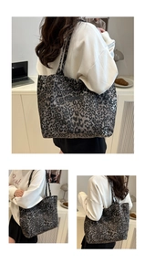 Detail view of large leopard print tote bag in grey canvas with spacious interior