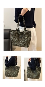 Detail view of large leopard print tote bag with thick shoulder straps and logo patch