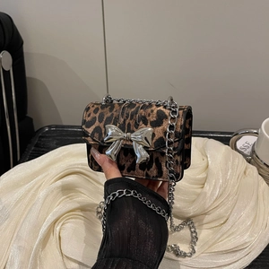 Mini leopard print crossbody bag with silver metal bow and stylish chain strap