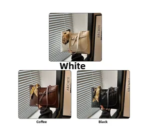 Three crocodile pattern tote bags in white, brown, and black with floral silk scarf detail