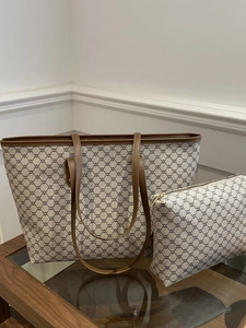 Classic large brown tote bag with geometric pattern and matching small zipper pouch