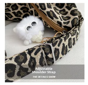 Detail of adjustable leopard print strap with silver buckle and plush monster charm