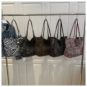 Selection of large canvas tote bags in zebra and leopard animal prints for daily use
