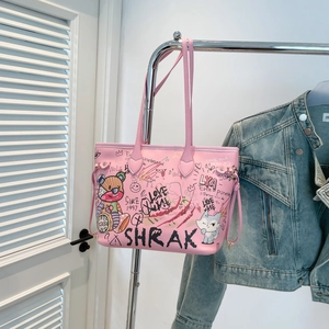 Pink graffiti tote bag with cartoon bear illustrations and casual shoulder straps