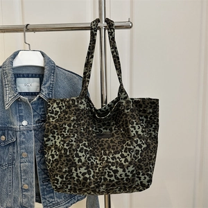Modern leopard print canvas tote bag in dark green with large capacity for daily use