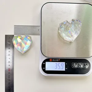 Detailed view of heart-shaped crystal phone stand showing 45mm width and 35.9g weight