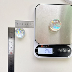 Macro shot showing crystal ball phone grip dimensions of 25mm diameter and 24.6g weight