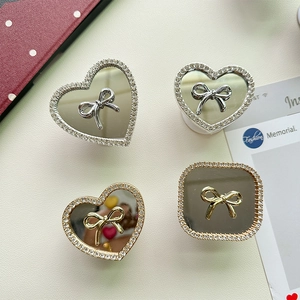 Sparkly rhinestone heart and square mirror phone socket grip with elegant metal bow
