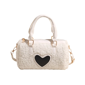 White faux shearling boston bag with heart patch and gold-tone metal hardware