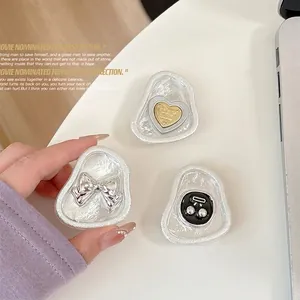 Cute bow and heart phone grip set with a pearlescent retractable stand for women