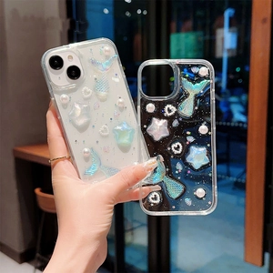 Detail of 3D mermaid tail and pearl decorations on clear iPhone case with city bokeh