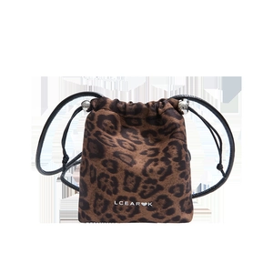 Fashionable leopard print bucket bag with drawstring closure and metal bead accents