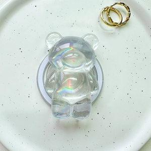 Detail of 3D iridescent bear popsocket with aurora crystal finish and adhesive base