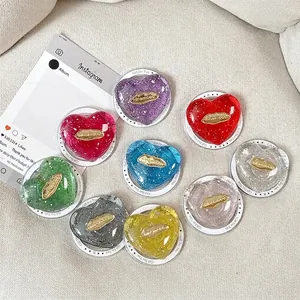 Transparent heart phone sockets with silver foil and gold lips in eight vibrant colors