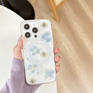 Detail of iPhone case featuring real blue dried flowers and MagSafe magnetic ring