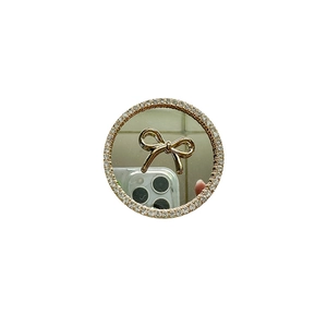 Foldable phone grip with golden bow, sparkling crystal rhinestones and mirror surface