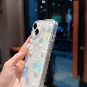 Close-up of glitter mermaid phone case with 3D pearls and shells for iPhone 16 Pro Max