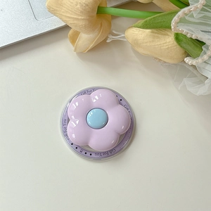 Detail of lavender flower phone grip with Gift For You print on a clear MagSafe base